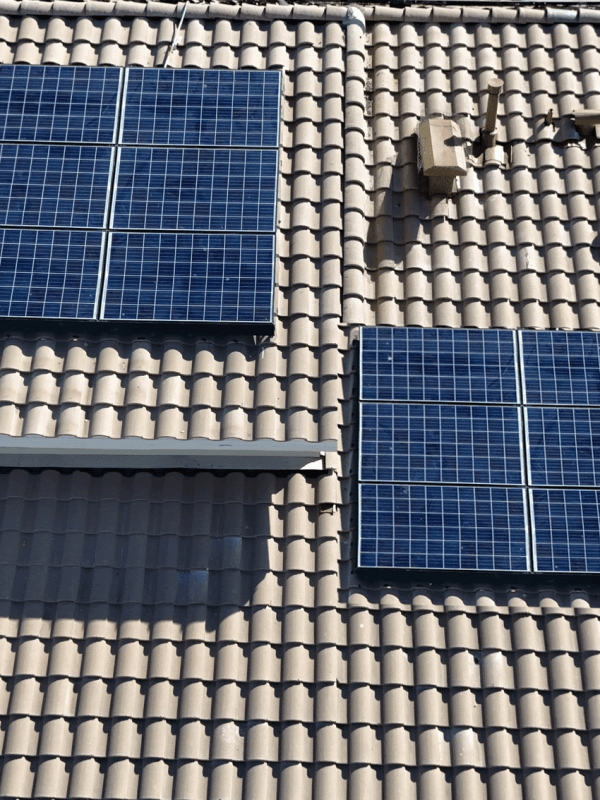 Professional roofing expert consulting with homeowner about roof inspection findings
