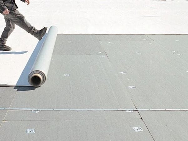 Arizona flat roof with integrated solar panel system installation